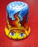 Uruguay  Sun Porcelain. blue porcelain thimble with a drawing of a sun. Uploaded by Winny